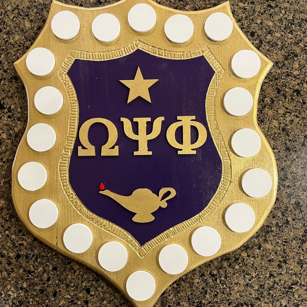 Purple and Gold Omega Psi Phi inner Shield
